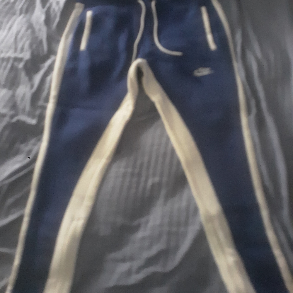 Blue and white nike sweatpants